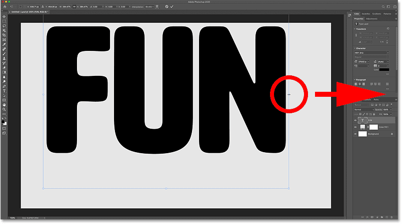 سحب مقابض التحويل لتغيير حجم النص في وثيقة Photoshop